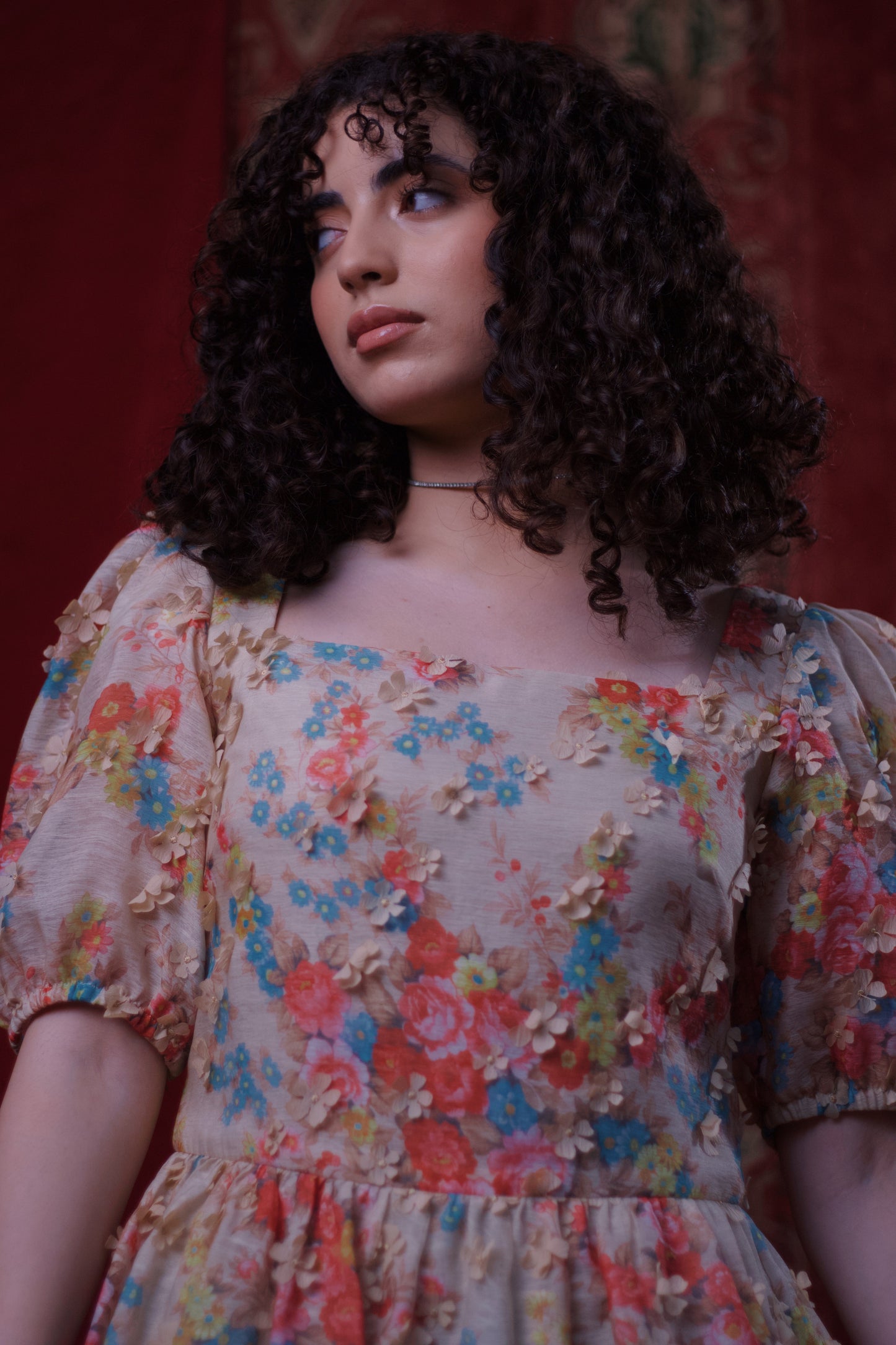 floral dress with female model looking to the side